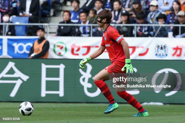 Masaaki Higashiguchi of Gamba Osaka in action during the J.League J1 match between Gamba Osaka and Urawa Red Diamonds at Panasonic Stadium Suita on...