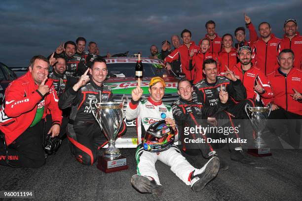 Race winner Rick Kelly driver of the Nissan Motorsport Nissan Altima celebrates after race 13 for the Supercars Winton SuperSprint on May 19, 2018 in...