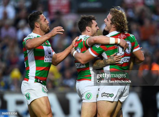 George Burgess of the Rabbitohs celebrates after scoring a try during the round 11 NRL match between the North Queensland Cowboys and the South...