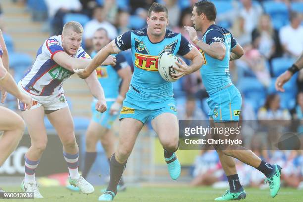 Anthony Don of the Titans runs the ball during the round 11 NRL match between the Gold Coast Titans and the Newcastle Knights at Cbus Super Stadium...