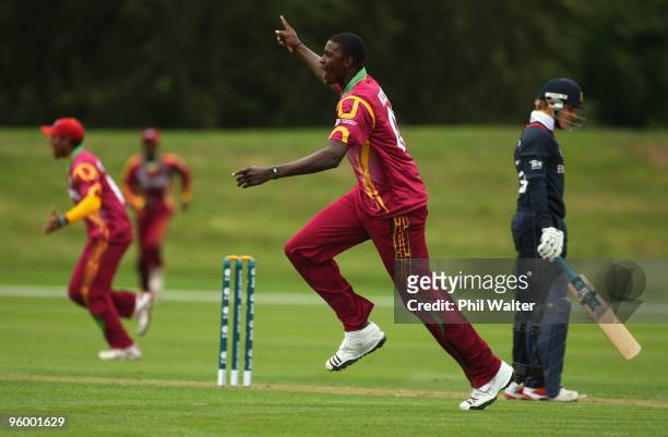 Jason Holder of the West Indies celebrates his wicket of Chris Dent of England during the ICC U19 Cricket World Cup Quarter Final One match between...