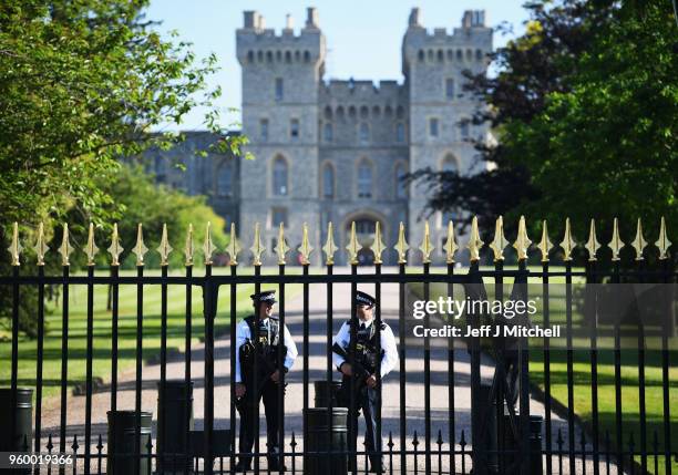 Armed police stand guard during the wedding of Prince Harry to Ms. Meghan Markle at Windsor Castle on May 19, 2018 in Windsor, England.