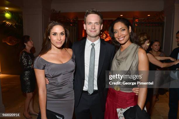 Meghan Markle, Patrick J. Adams and Gina Torres attend the InStyle and Hollywood Foreign Press Association's Toronto International Film Festival...
