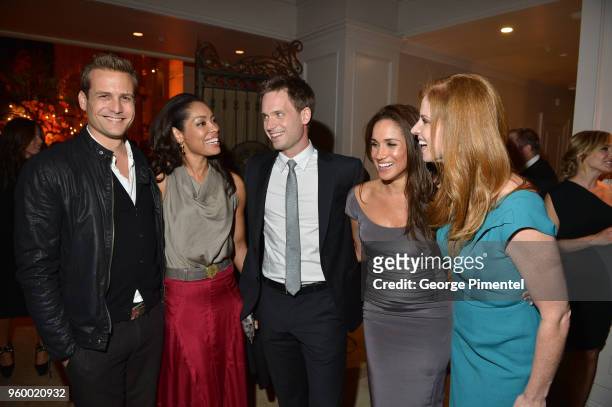 Gabriel Macht, Gina Torres, Patrick J. Adams, Meghan Markle and Sarah Rafferty attend the InStyle and Hollywood Foreign Press Association's Toronto...