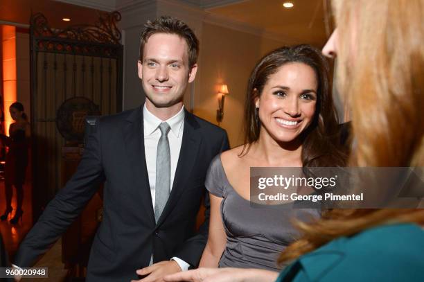 Patrick J. Adams and Meghan Markle attend the InStyle and Hollywood Foreign Press Association's Toronto International Film Festival Party at Windsor...