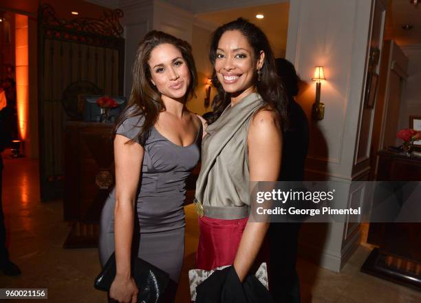 Actresses Meghan Markle and Gina Torres attend the InStyle and Hollywood Foreign Press Association's Toronto International Film Festival Party at...
