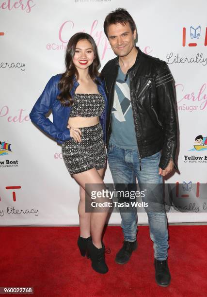 Carly Peeters and Kash Hovey attend "Stuck on a Feelin" music video & single release for Carly Peeters at Cherry Soda Studios on May 18, 2018 in Los...