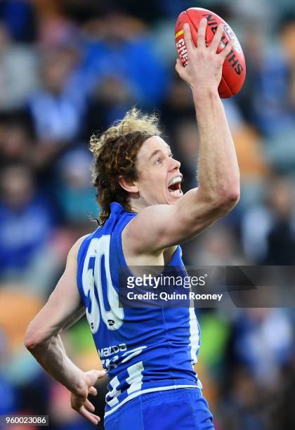 Ben Brown of the Kangaroos marks during the round nine AFL match between the North Melbourne Kangaroos and the Greater Western Sydney Giants at...