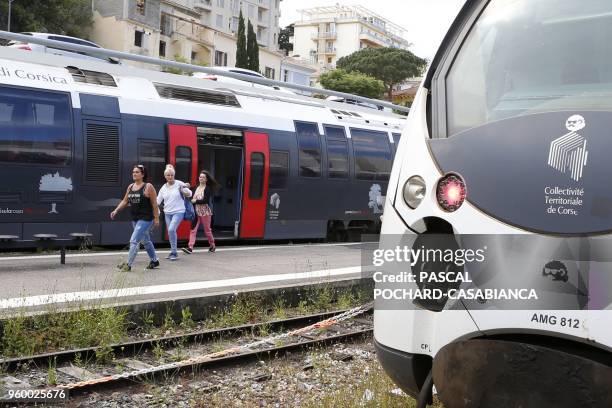 People step out the train in Bastia railway station on May 15, 2018 in Bastia on the French Mediterranean island of Corsica.