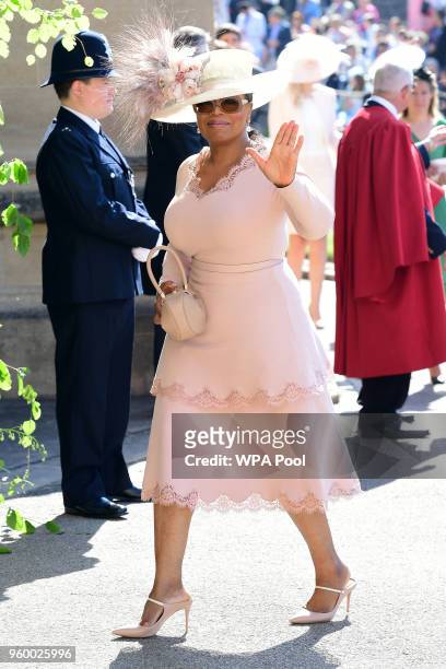 Oprah Winfrey arrives at St George's Chapel at Windsor Castle before the wedding of Prince Harry to Meghan Markle on May 19, 2018 in Windsor, England.