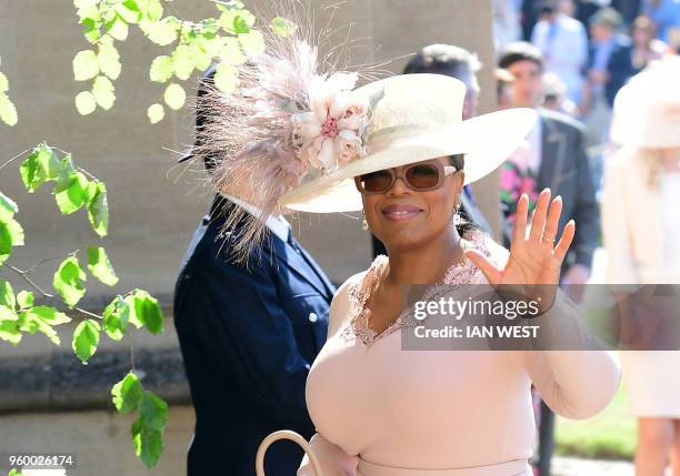 Presenter Oprah Winfrey arrives for the wedding ceremony of Britain's Prince Harry, Duke of Sussex and US actress Meghan Markle at St George's...