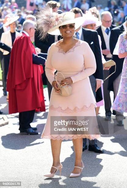 Presenter Oprah Winfrey arrives for the wedding ceremony of Britain's Prince Harry, Duke of Sussex and US actress Meghan Markle at St George's...