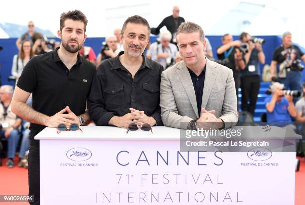Actor Dogu Demirkol, director Nuri Bilge Ceylan, and Murat Cemcir attend "Ahlat Agaci" Photocall during the 71st annual Cannes Film Festival at...