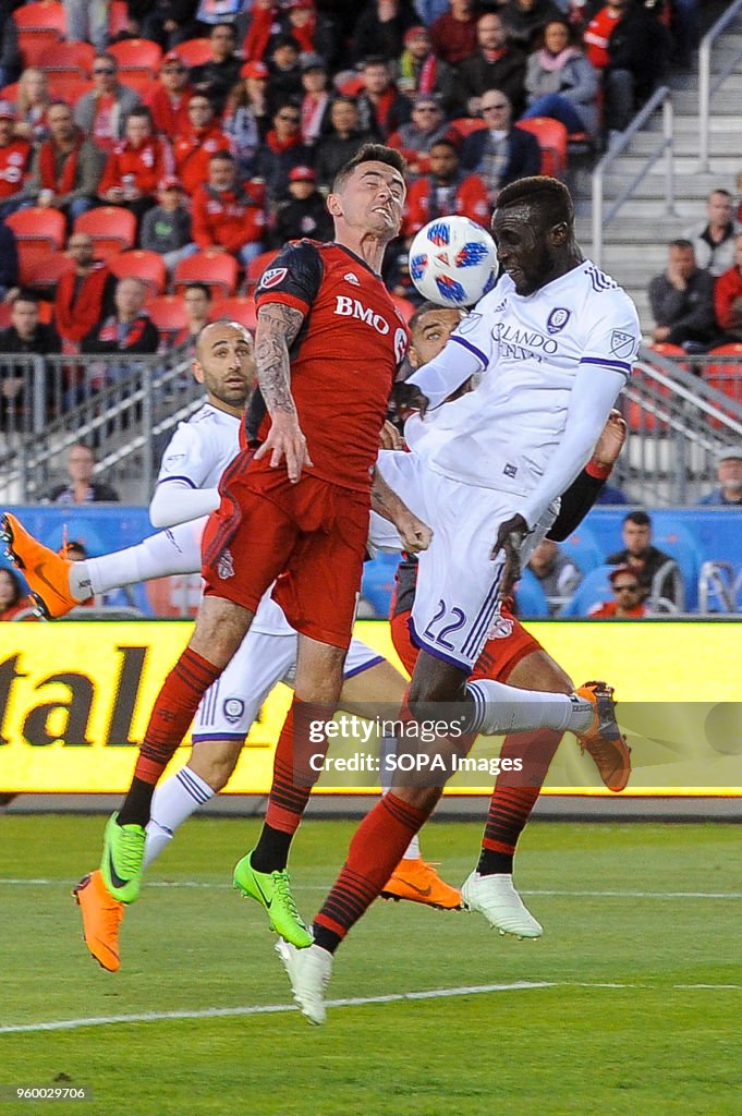 Jay Chapman (L) and Lamine Sané (R) seen jumping for the...