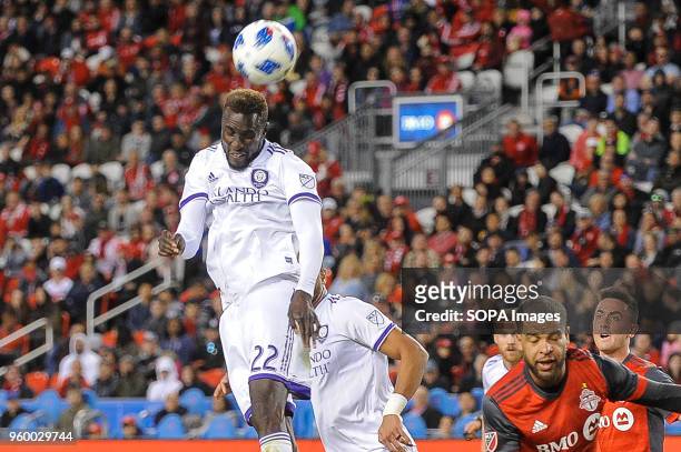 Lamine Sané seen heading the ball by head during 2018 MLS Regular Season match between Toronto FC and Orlando City SC at BMO Field .