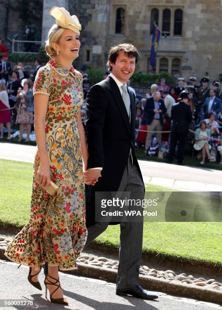 Prince's Harry's friend, British singer James Blunt and and Sofia Wellesley arrive for the wedding ceremony of Britain's Prince Harry and US actress...