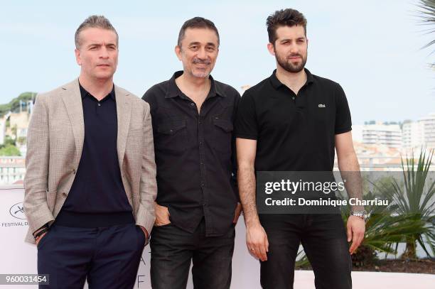 Actor Murat Cemcir, Director Nuri Bilge Ceylan and Actor Aydin Dogu Demirkol attends the photocall for the "Ahlat Agaci" during the 71st annual...