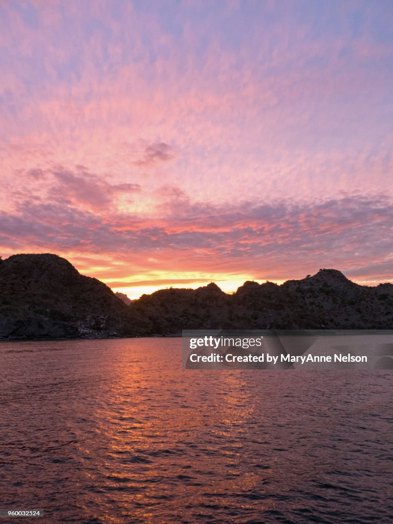 Bright Water Reflections with Pastel Sunset