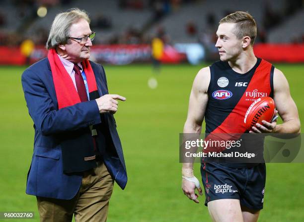 Devon Smith of Essendon celebrates the win with Bombers legend Kevin Sheedy during the round nine AFL match between the Essendon Bombers and the...