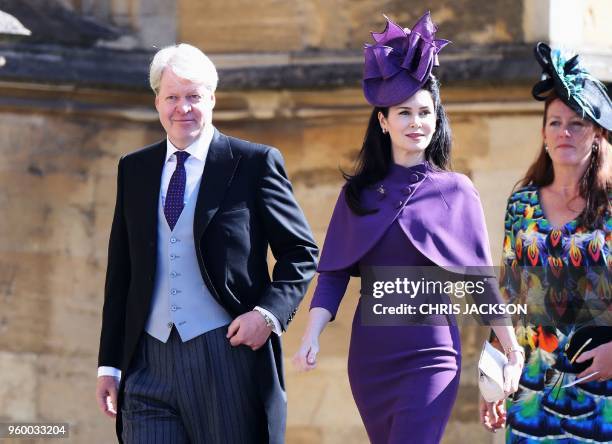 Charles Spencer, 9th Earl Spencer and his wife, Karen Spencer arrive for the wedding ceremony of Britain's Prince Harry, Duke of Sussex and US...