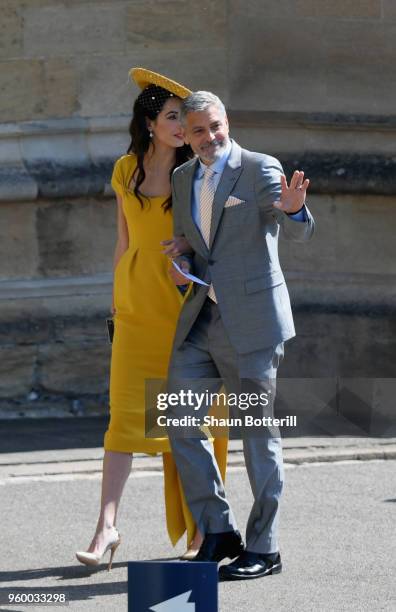 George and Amal Clooney attend the wedding of Prince Harry to Ms Meghan Markle at St George's Chapel, Windsor Castle on May 19, 2018 in Windsor,...