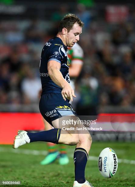 Michael Morgan of the Cowboys kicks a field goal during the round 11 NRL match between the North Queensland Cowboys and the South Sydney Rabbitohs at...