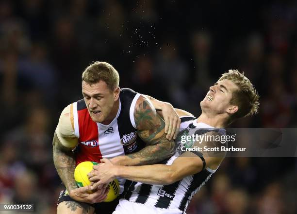 Tim Membrey of the Saints and Sam Murray of the Magpies compete for the ball during the round nine AFL match between the St Kilda Saints and the...