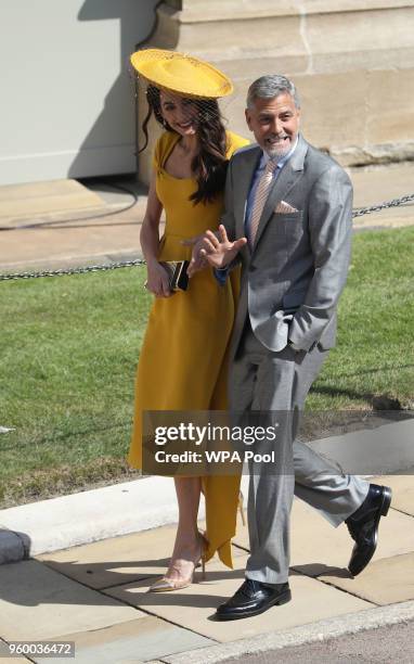 Amal and George Clooney arrive at St George's Chapel, Windsor Castle for the wedding of Meghan Markle and Prince Harry at St George's Chapel, Windsor...