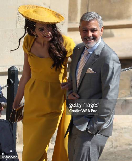 Amal and George Clooney arrive at St George's Chapel, Windsor Castle for the wedding of Meghan Markle and Prince Harry at St George's Chapel, Windsor...