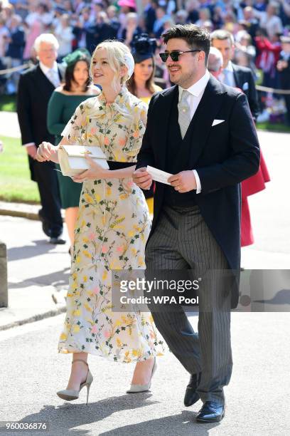 Marcus Mumford and Carey Mulligan arrive at St George's Chapel at Windsor Castle before the wedding of Prince Harry to Meghan Markle on May 19, 2018...