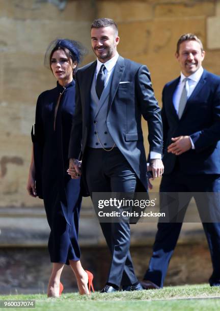 Victoria Beckham and David Beckham arrive at the wedding of Prince Harry to Ms Meghan Markle at St George's Chapel, Windsor Castle on May 19, 2018 in...