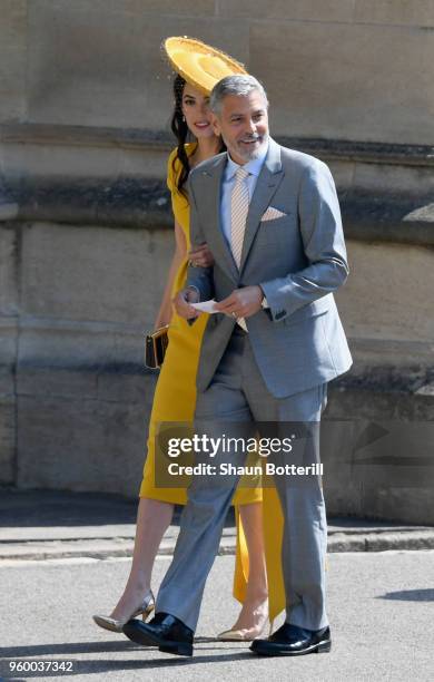 George and Amal Clooney attend the wedding of Prince Harry to Ms Meghan Markle at St George's Chapel, Windsor Castle on May 19, 2018 in Windsor,...