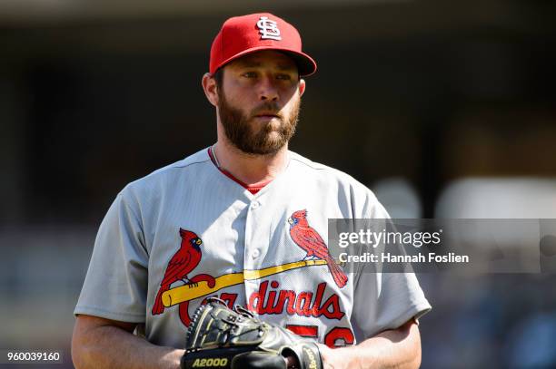 Greg Holland of the St. Louis Cardinals looks on during the interleague game against the Minnesota Twins on May 16, 2018 at Target Field in...