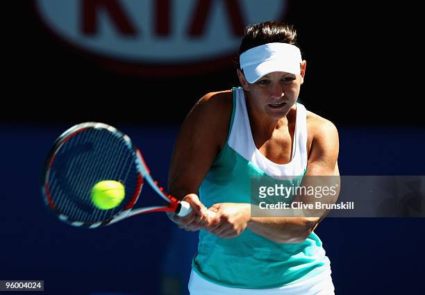 Casey Dellacqua of Australia plays a backhand in her third round match against Venus Williams of the United States of America during day six of the...
