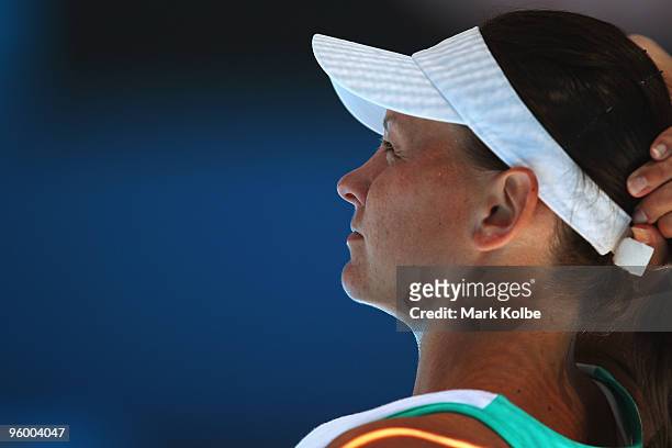 Casey Dellacqua of Australia looks on between games in her third round match against Venus Williams of the United States of America during day six of...