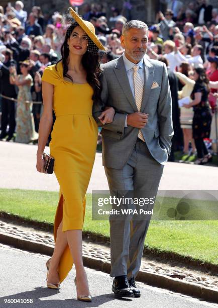 George Clooney and Amal Clooney arrive for the wedding ceremony of Britain's Prince Harry and US actress Meghan Markle at St George's Chapel, Windsor...