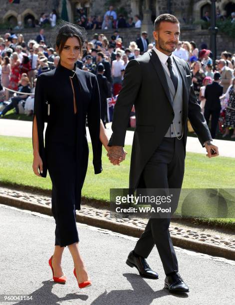 Victoria Beckham and David Beckham arrives for the wedding ceremony of Britain's Prince Harry and US actress Meghan Markle at St George's Chapel,...