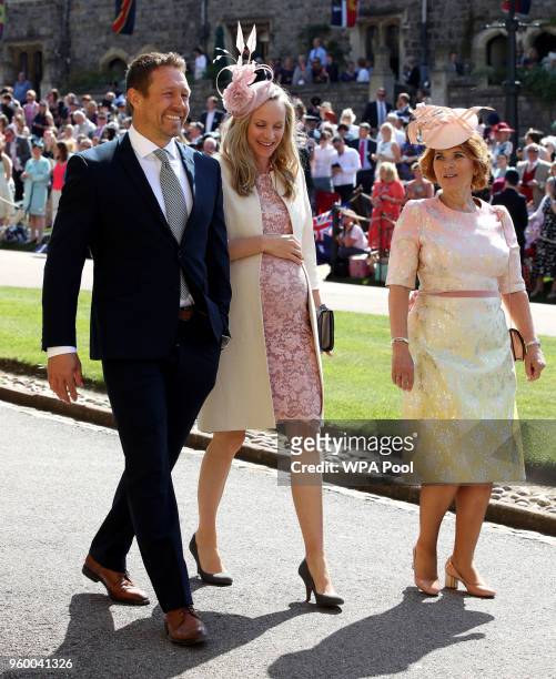 Jonny Wilkinson and his pregnant wife Shelley Jenkins arrive for the wedding ceremony of Britain's Prince Harry and US actress Meghan Markle at St...