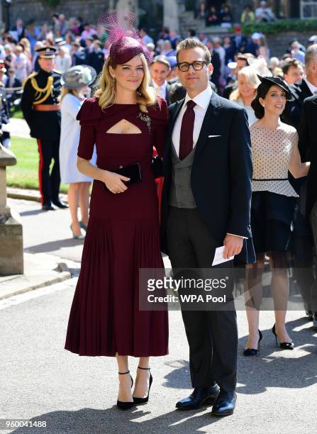 Actor Gabriel Macht and wife Jacinda Barrett arrive at St George's Chapel at Windsor Castle before the wedding of Prince Harry to Meghan Markle on...