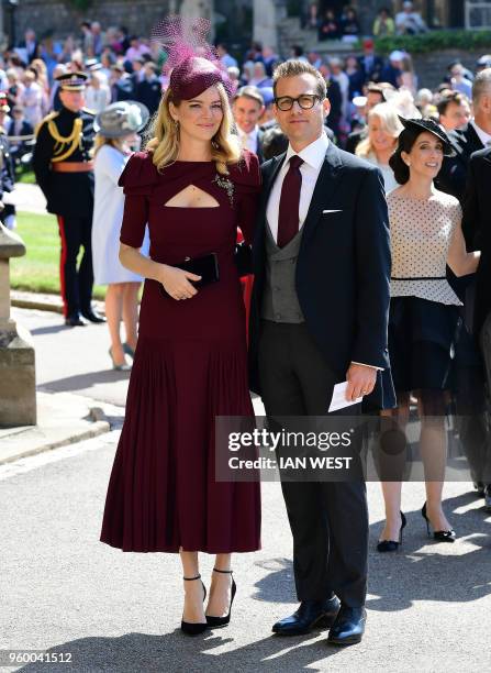 Meghan Markle's friend, US actor Gabriel Macht and wife Jacinda Barrett arrive for the wedding ceremony of Britain's Prince Harry, Duke of Sussex and...