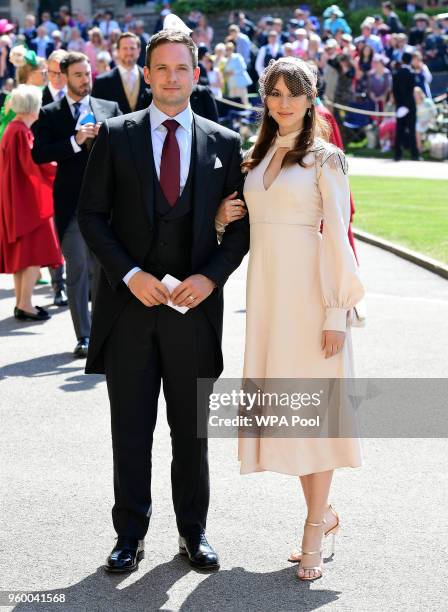 Actor Patrick J. Adams and wife Troian Bellisario arrive at St George's Chapel at Windsor Castle before the wedding of Prince Harry to Meghan Markle...