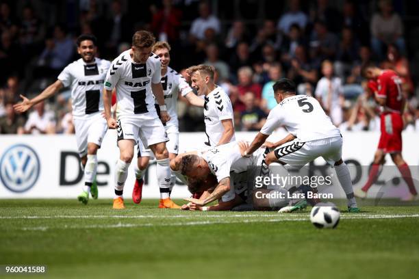 Enzo Leopold of Freiburg celebrates with his teammates after scoring his teams first goal during the DFB Juniors Cup Final 2018 between 1. FC...