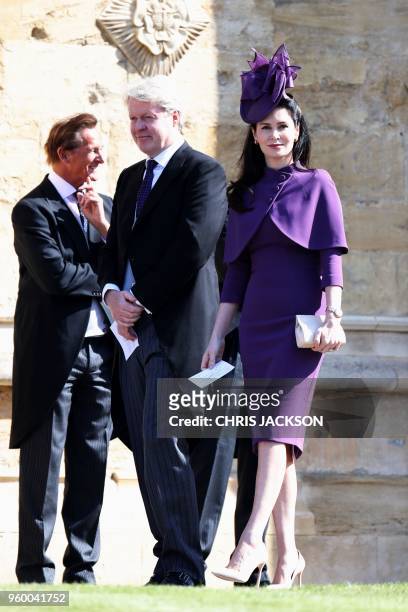 Charles Spencer, 9th Earl Spencer and his wife Karen Spencer, Countess Spencer arrive for the wedding ceremony of Britain's Prince Harry, Duke of...