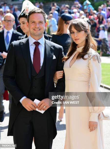 Meghan Markle's friend, US actor Patrick J. Adams and wife Troian Bellisario arrive for the wedding ceremony of Britain's Prince Harry, Duke of...
