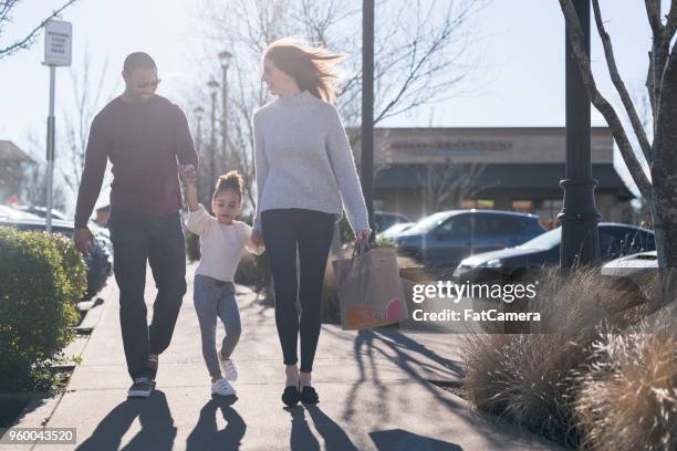 family outing to the grocery store - happy family shopping grocery stock pictures, royalty-free photos & images