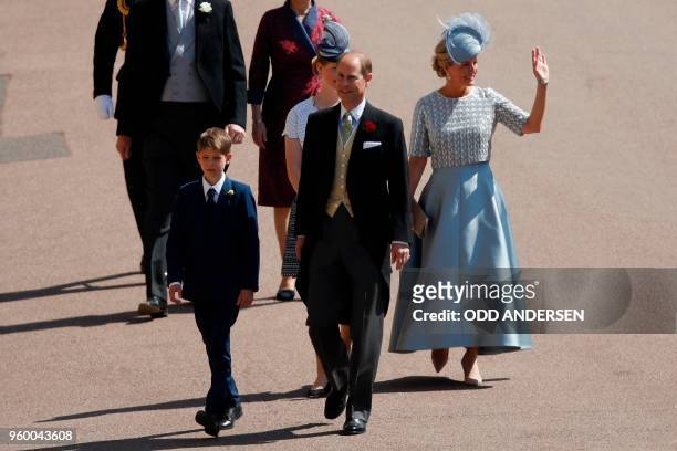 Britain's Prince Edward, Earl of Wessex, arrives with Britain's Sophie, Countess of Wessex, and James, Viscount Severn arrive for the wedding...