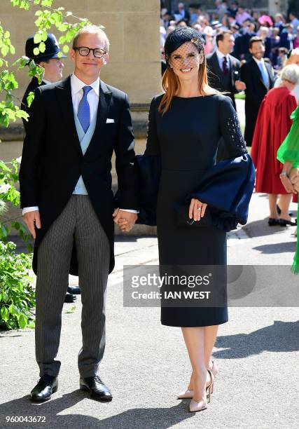 Meghan Markle's friend, US actress Sarah Rafferty and husband Santtu Seppala arrive for the wedding ceremony of Britain's Prince Harry, Duke of...