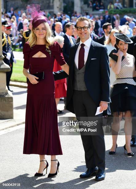 Actor Gabriel Macht and wife Jacinda Barrett arrive at St George's Chapel at Windsor Castle before the wedding of Prince Harry to Meghan Markle on...
