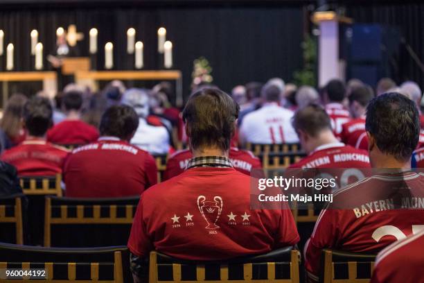 Fans of Bayern Muenchen attend Ecumencial Church Service prior DFB Cup Final 2018 on May 19, 2018 in the Kaiser Wilhelm Memorial Church in Berlin,...