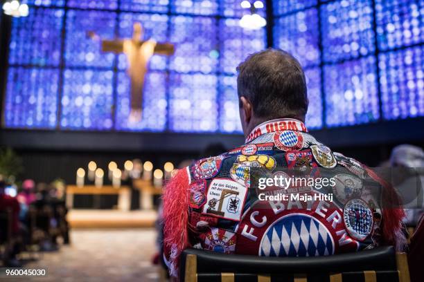 Fans of Bayern Muenchen attend Ecumencial Church Service prior DFB Cup Final 2018 on May 19, 2018 in the Kaiser Wilhelm Memorial Church in Berlin,...